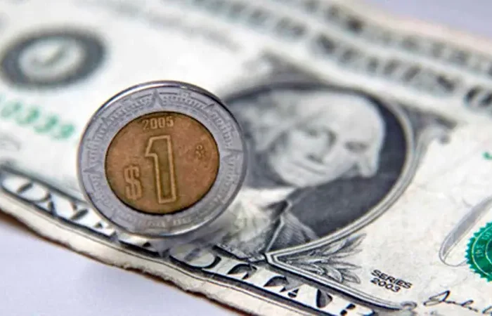 El peso se ubica en un nivel de 18.98 unidades por dólar
