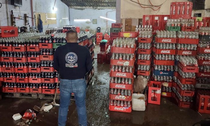 Localizan otra fábrica de Coca Cola pirata en México