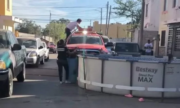 Instalan alberca en la calle; seguridad pública la retira