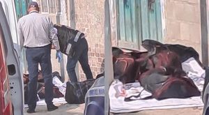 Con amenazas para el CJNG, abandonan maletas con restos humanos en EdoMex
